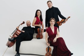 four people holding strings posing four people holding strings posing